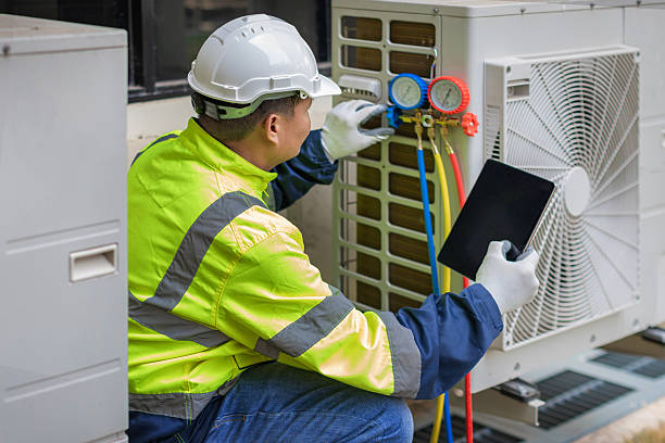 Professional Air Duct Cleaning technician working in Four Oaks, NC